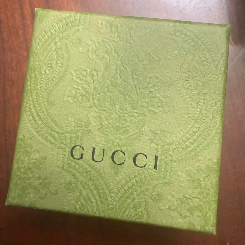 Brand Gucci twirly comes with box